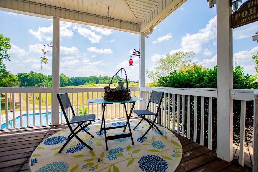 575 Liberty Church Road Carrollton, GA 30116 - Photo 68 of 95 a view of a two chairs in the balcony