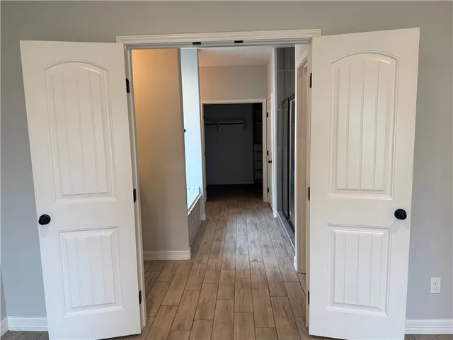 a bathroom with a sink and mirror