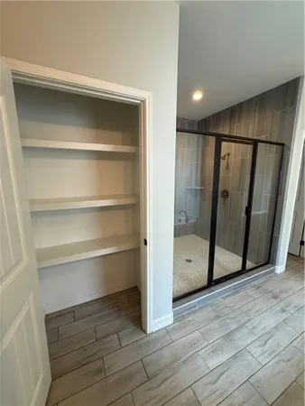 a view of an empty walk in closet