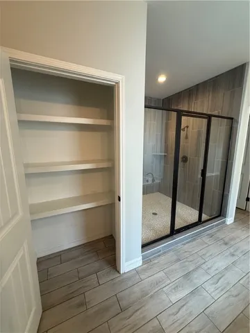 a view of an empty walk in closet