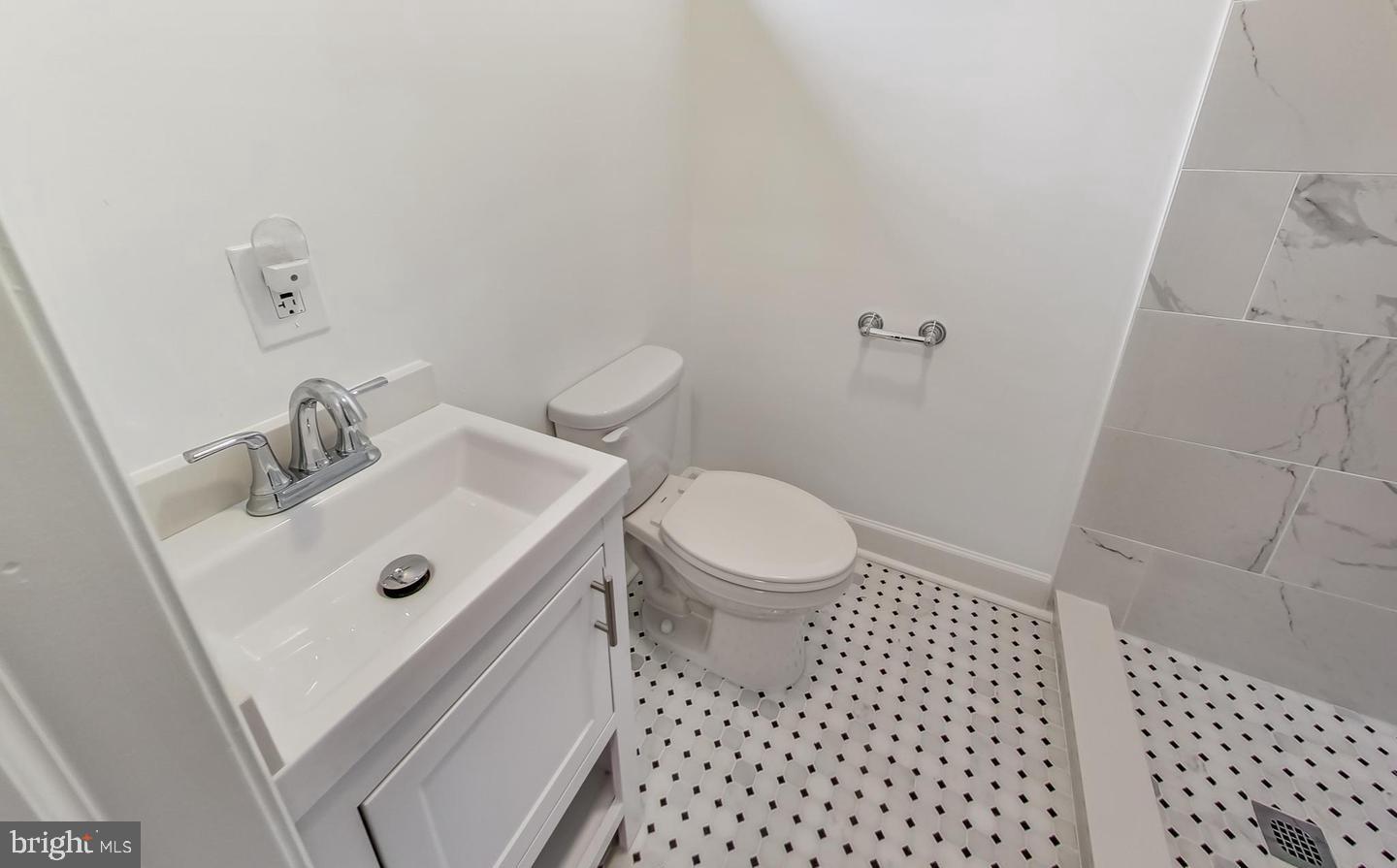 5923 Berwyn Road College Park, MD 20740 - Photo 31 of 51 a bathroom with a sink a toilet and a mirror