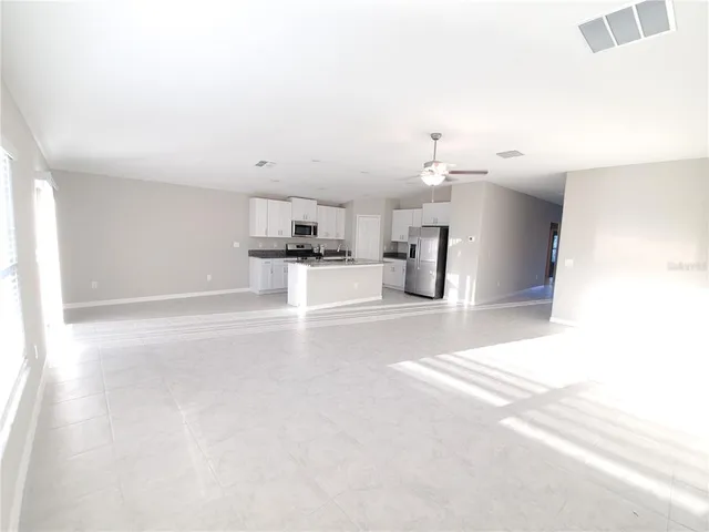 a view of a kitchen with a sink