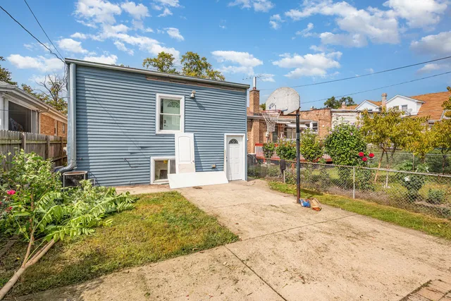 a backyard of a house with a lake view