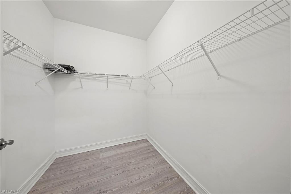 28419 Captiva Shell Loop Bonita Springs, FL 34135 - Photo 20 of 41 a view of a room with racks on the wall