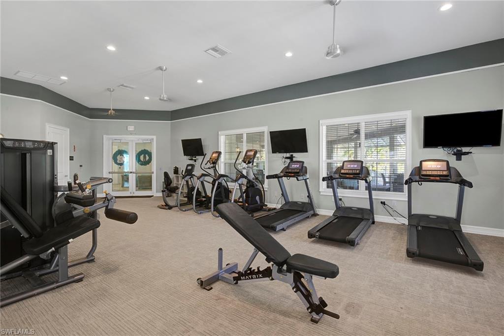 28419 Captiva Shell Loop Bonita Springs, FL 34135 - Photo 34 of 41 a view of a workspace with gym equipment
