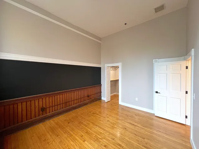 a view of entryway with wooden floor