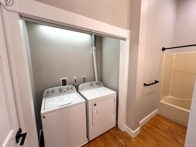 a utility room with dryer and washer