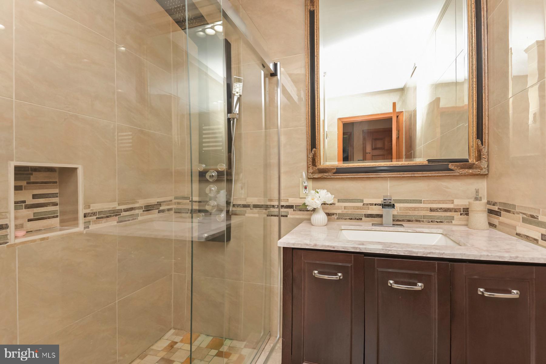 467 Gordon Road Robbinsville, NJ 08691 - Photo 16 of 41 a bathroom with a sink double vanity and a mirror