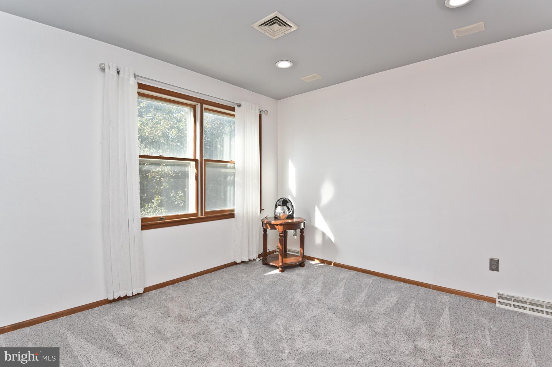 467 Gordon Road Robbinsville, NJ 08691 - Photo 21 of 41 a view of an empty room with a window