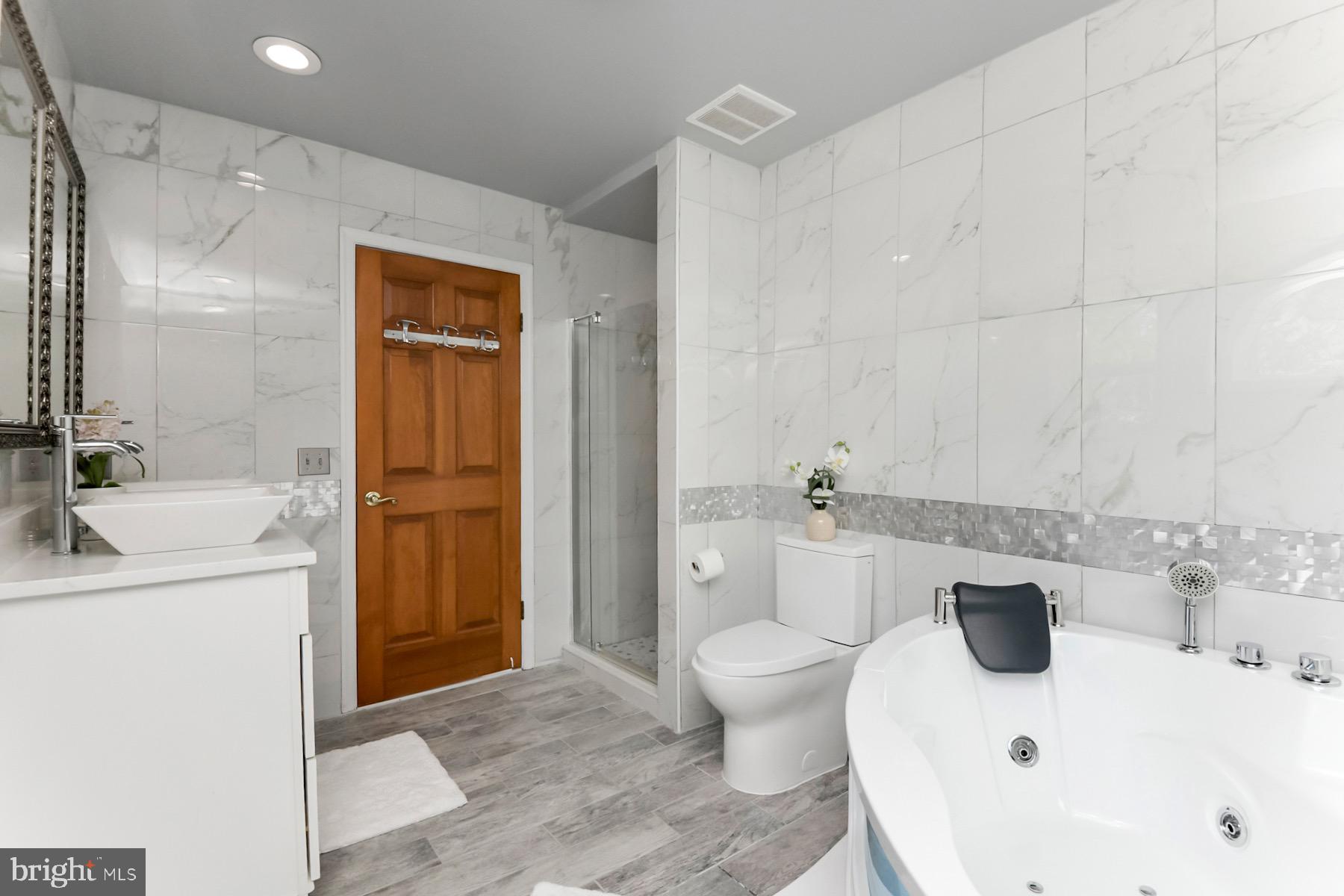 467 Gordon Road Robbinsville, NJ 08691 - Photo 30 of 41 a bathroom with a sink a toilet and shower