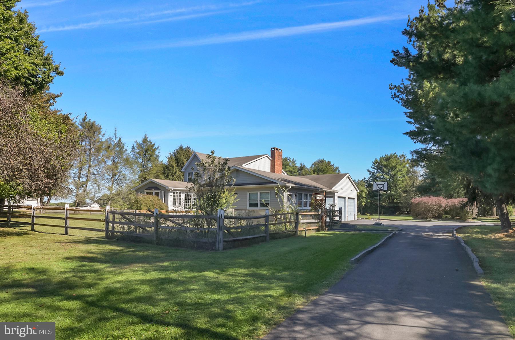 467 Gordon Road Robbinsville, NJ 08691 - Photo 34 of 41 a view of a big house with a big yard and large trees