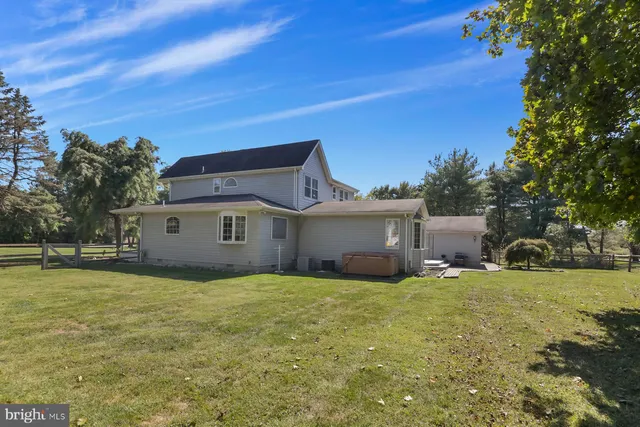 a view of a house with a big yard