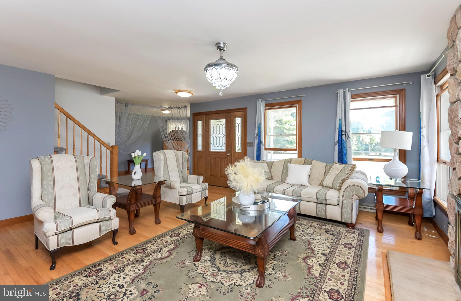 467 Gordon Road Robbinsville, NJ 08691 - Photo 5 of 41 a living room with furniture a table and a large window
