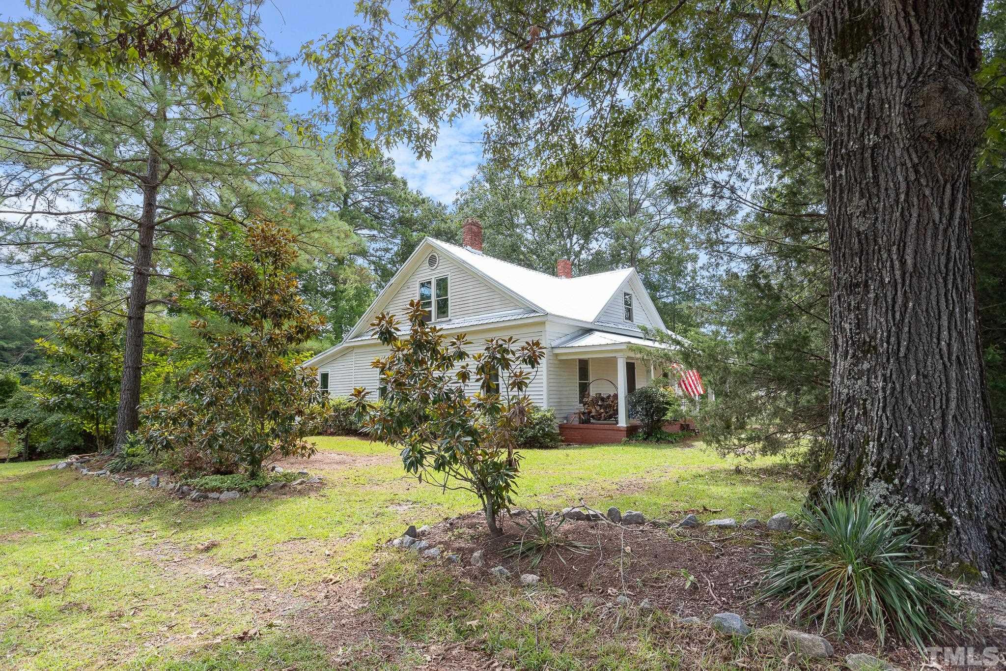 599 Federal Road Benson, NC 27504 - Photo 2 of 30 a view of a house with a yard