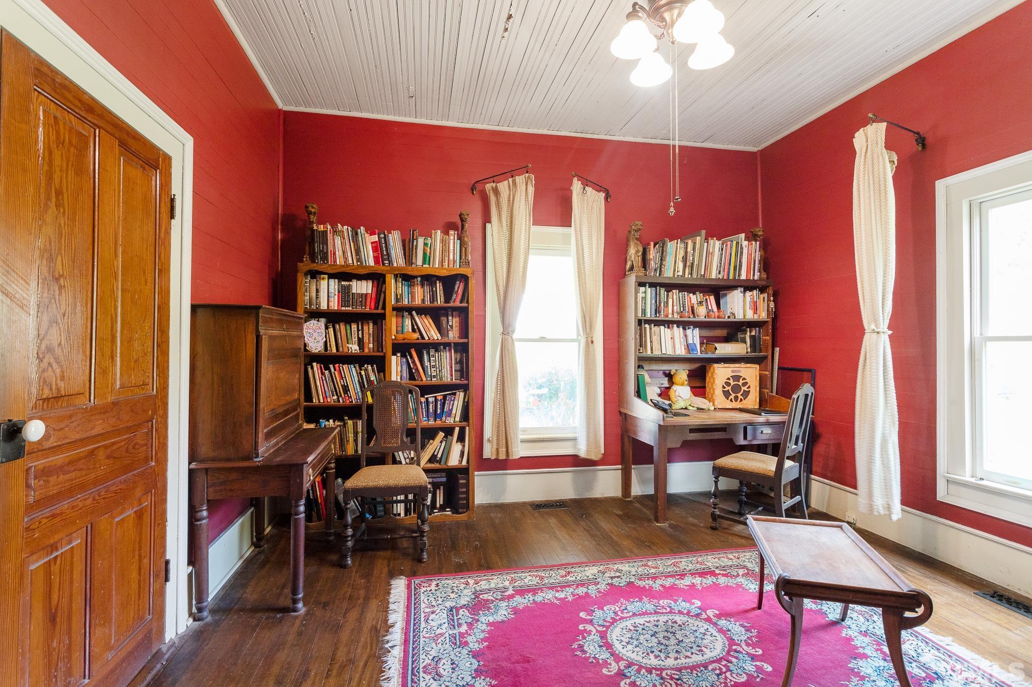 599 Federal Road Benson, NC 27504 - Photo 24 of 30 a living room with furniture a rug and a window