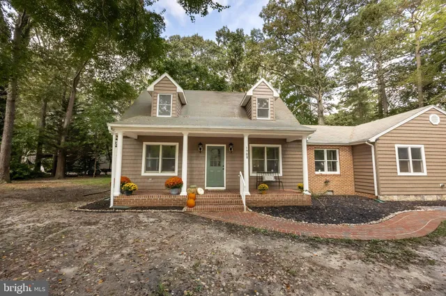 a view of a balcony with wooden floor