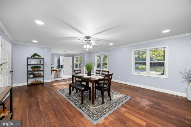 a bathroom with a double vanity sink and mirror