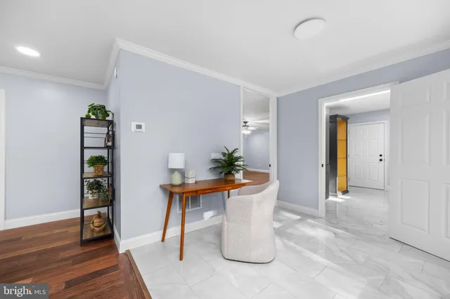 a bathroom with a granite countertop toilet sink and mirror