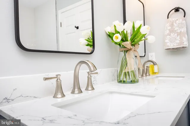 a view of entryway livingroom and hall with wooden floor