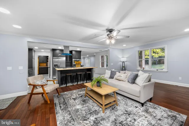 a kitchen with a sink cabinets and stainless steel appliances