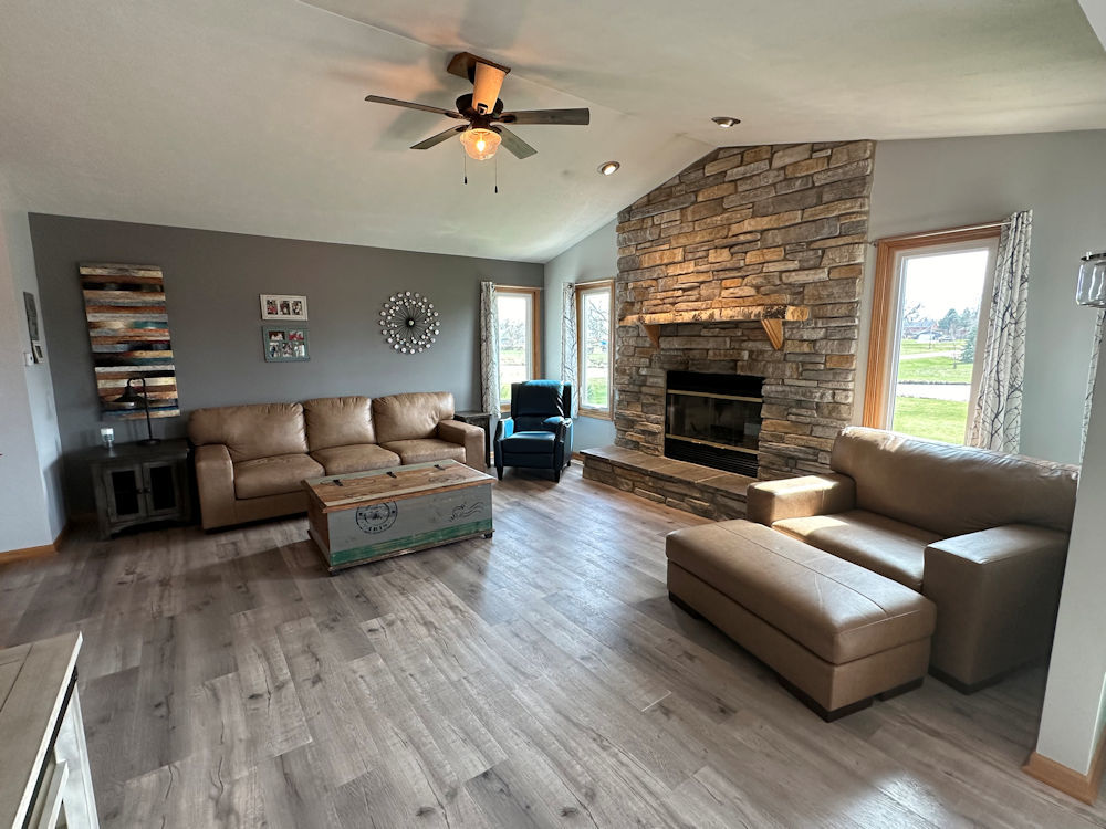 10965 Barron Road Chana, IL 61015 - Photo 5 of 27 a living room with furniture and a fireplace