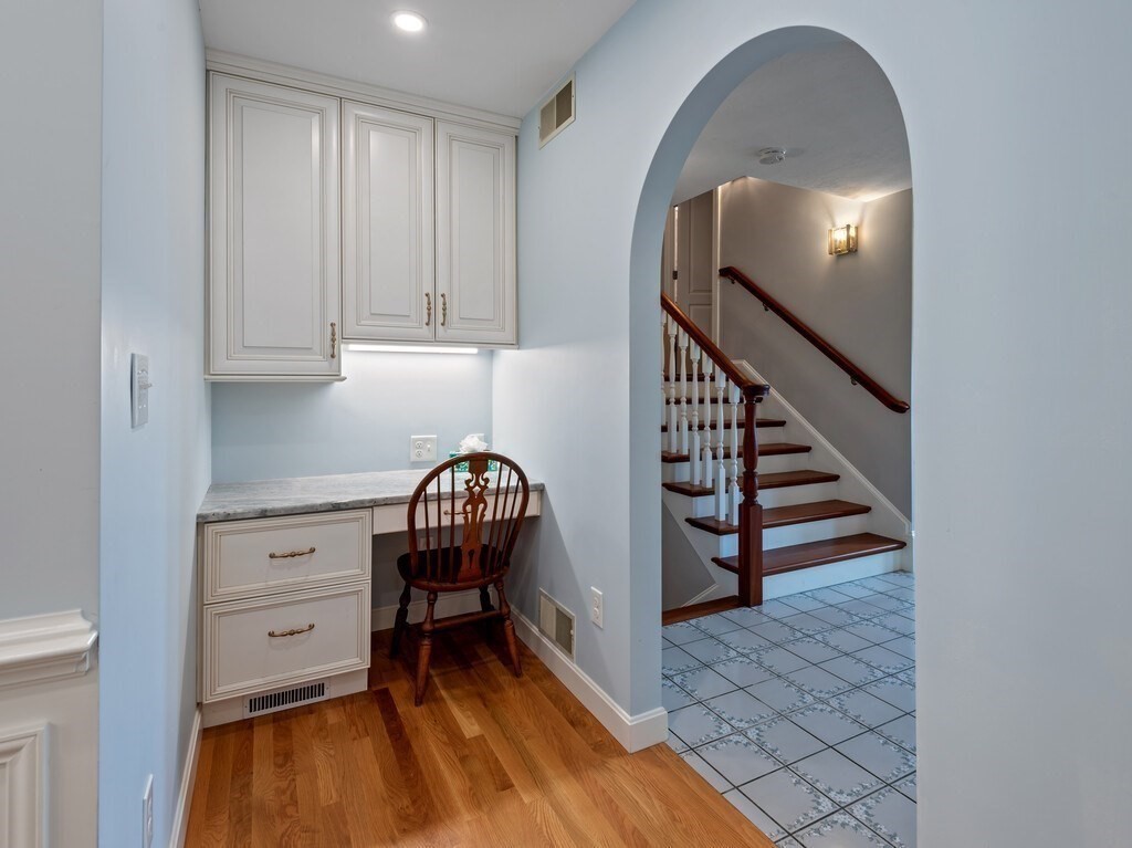 1 Corbin Road Dudley, MA 01571 - Photo 14 of 42 a view of a livingroom with wooden floor and staircase