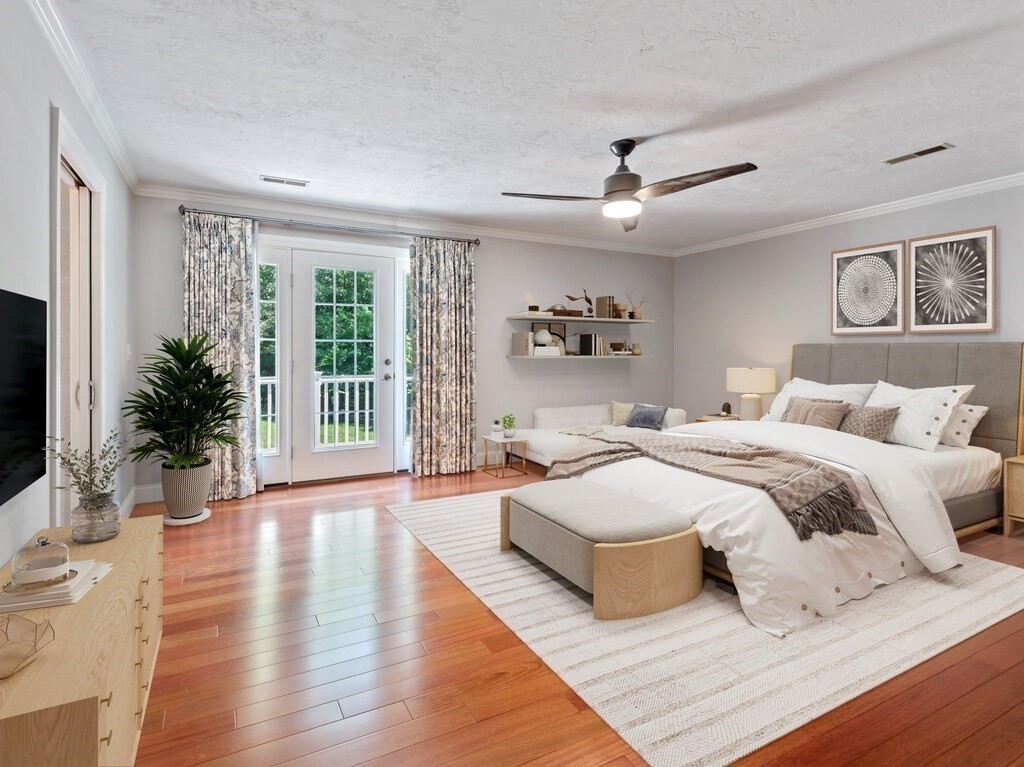 1 Corbin Road Dudley, MA 01571 - Photo 25 of 42 a spacious bedroom with a large bed and a large window