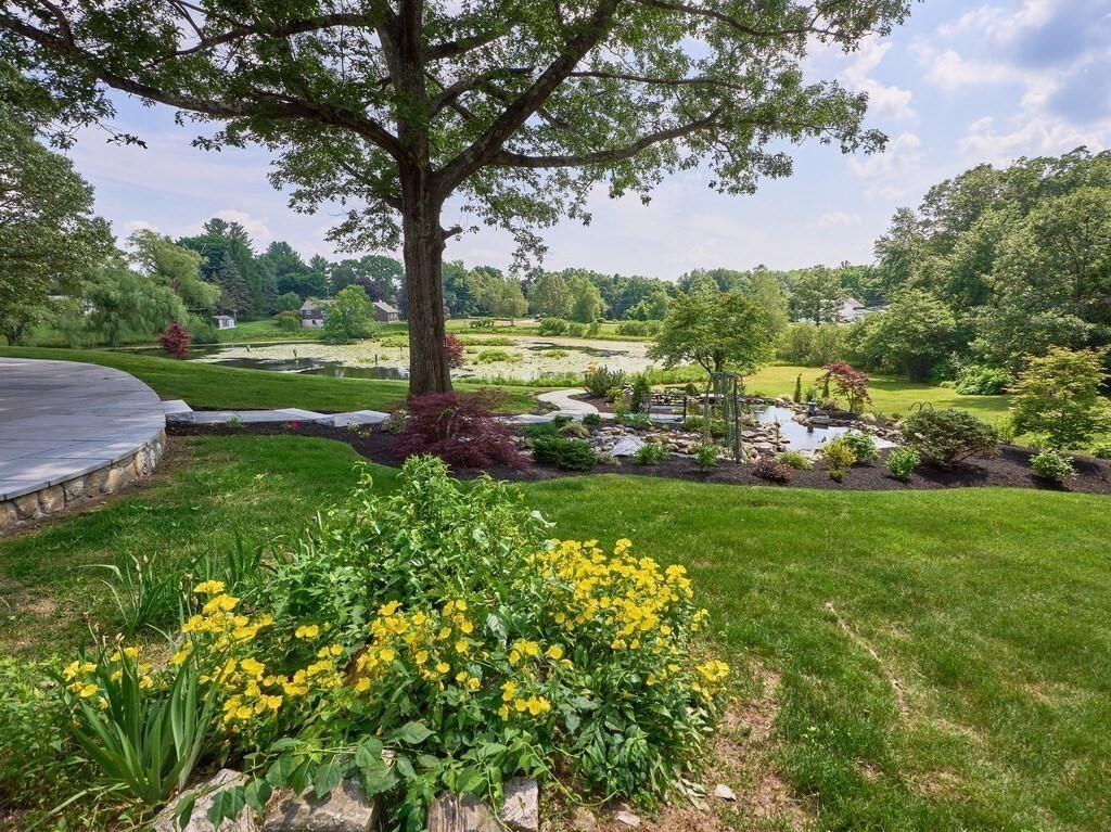 1 Corbin Road Dudley, MA 01571 - Photo 3 of 42 a view of a garden with a tree