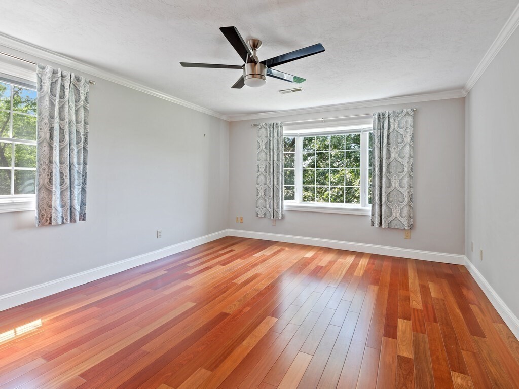 1 Corbin Road Dudley, MA 01571 - Photo 34 of 42 a view of an empty room with wooden floor and a window