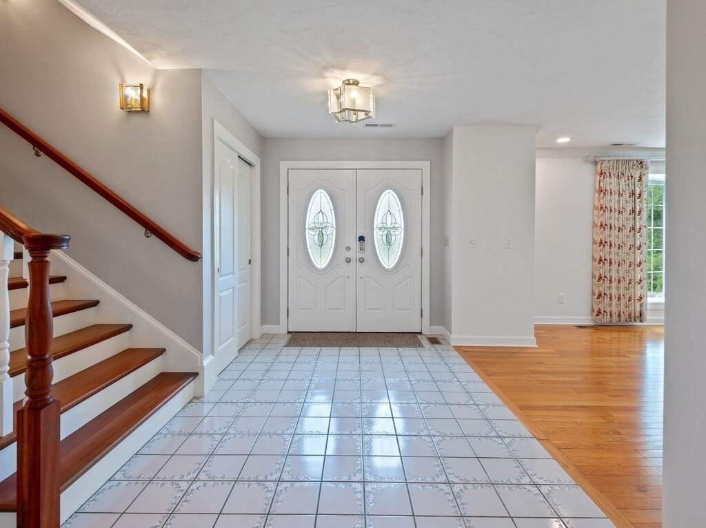 1 Corbin Road Dudley, MA 01571 - Photo 5 of 42 a view of entryway with stairs