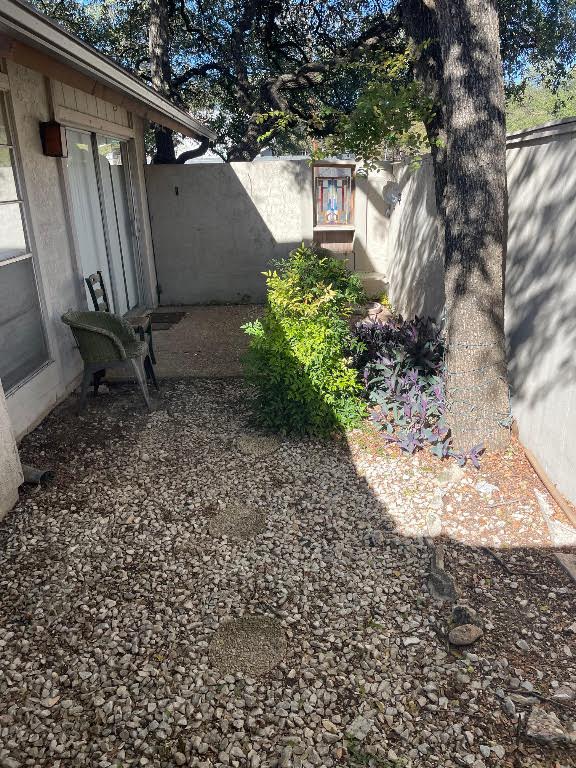 8105 Ceberry Drive, Unit B Austin, TX 78759 - Photo 8 of 12 a view of a backyard