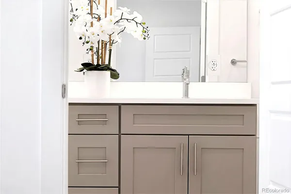 a sink with a mirror