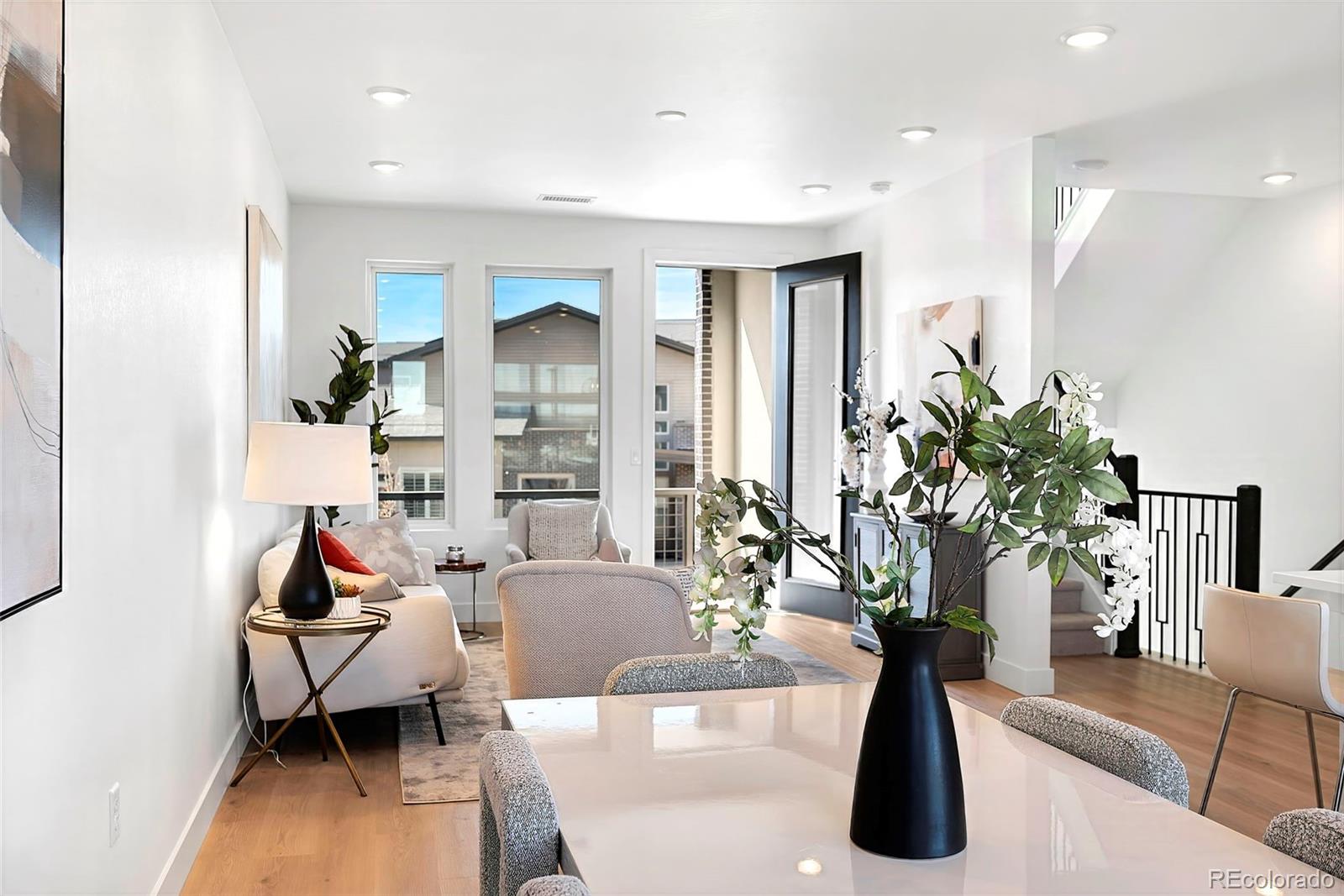 16 Oneida Court Denver, CO 80230 - Photo 4 of 19 a living room with furniture and a large window