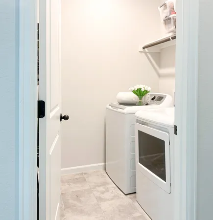 a room with furniture and fan