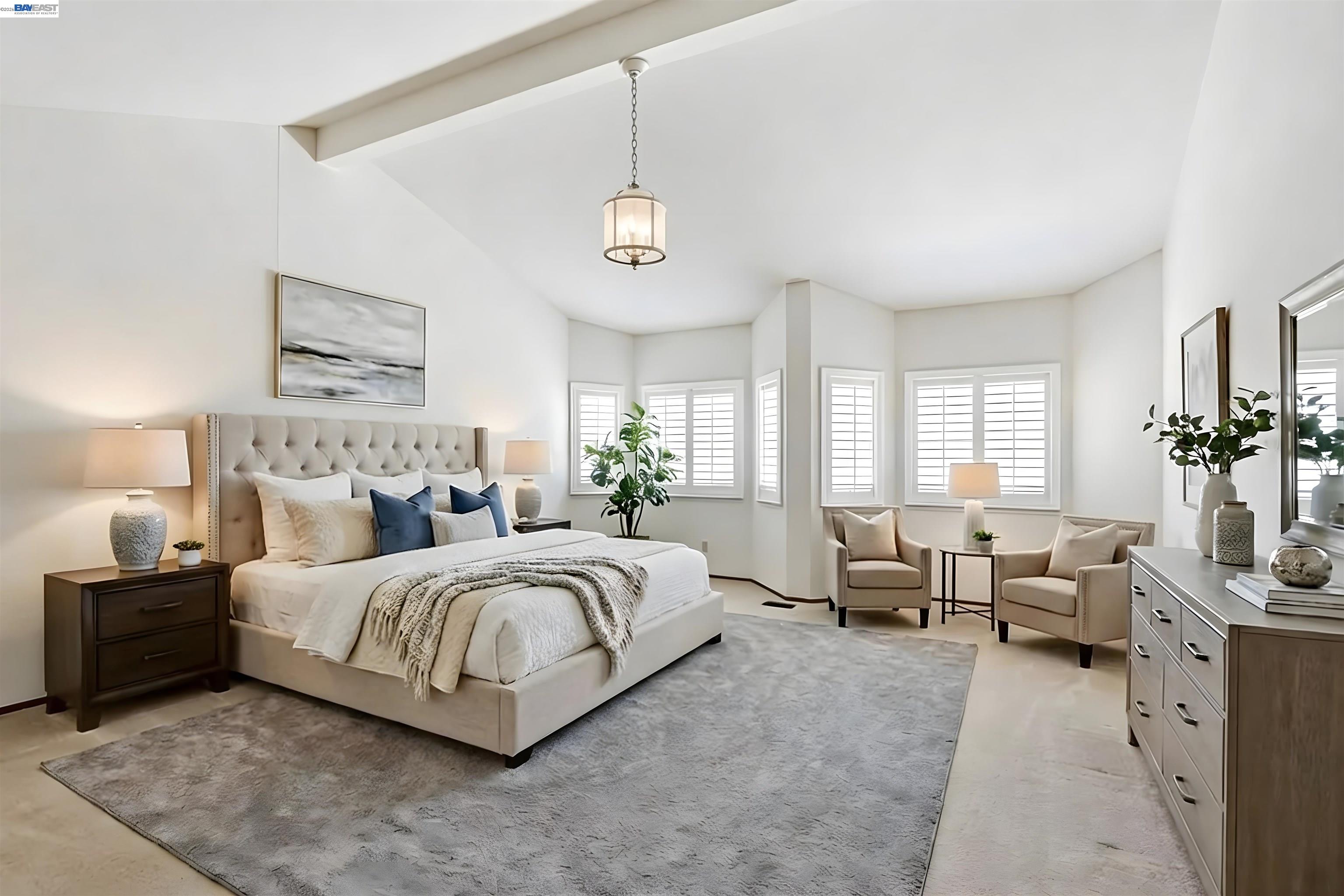 559 Cherry Way Hayward, CA 94541 - Photo 11 of 50 a spacious bedroom with a bed a couch and potted plant on the dresser