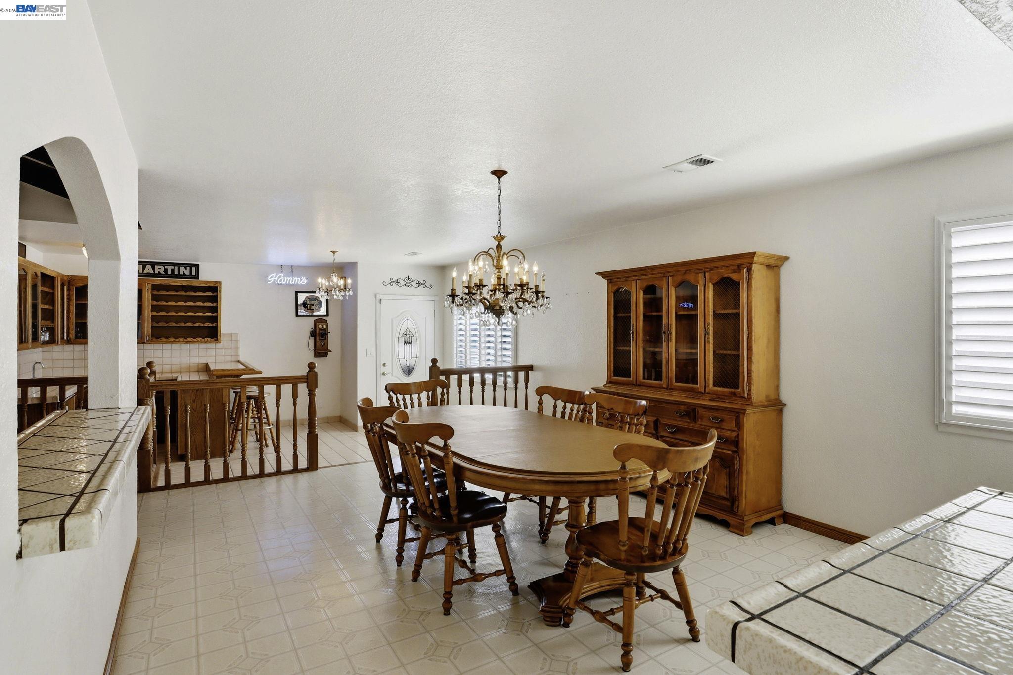 559 Cherry Way Hayward, CA 94541 - Photo 24 of 50 a dining room with furniture and window