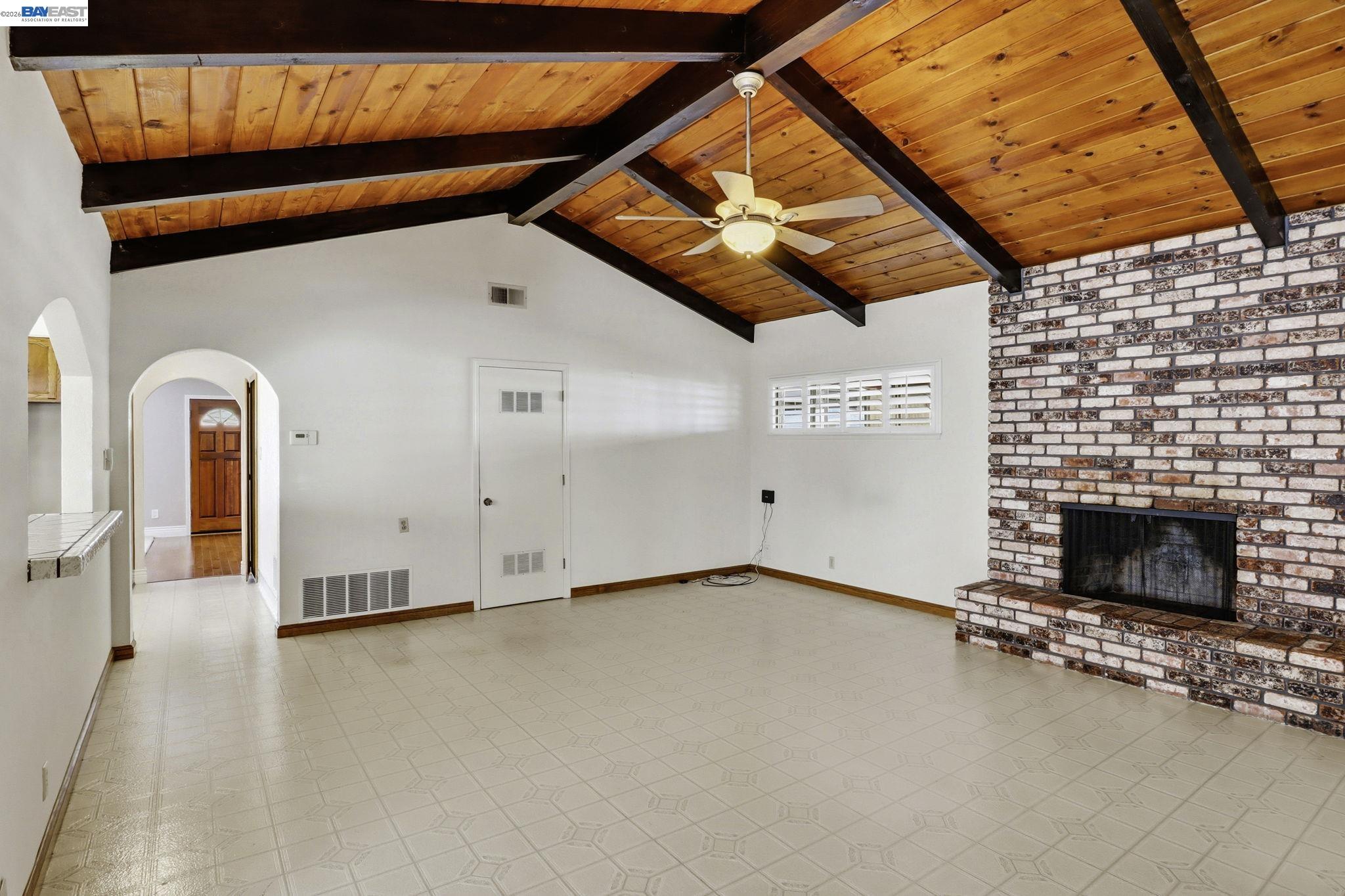 559 Cherry Way Hayward, CA 94541 - Photo 27 of 50 a view of a livingroom with wooden floor and a fireplace