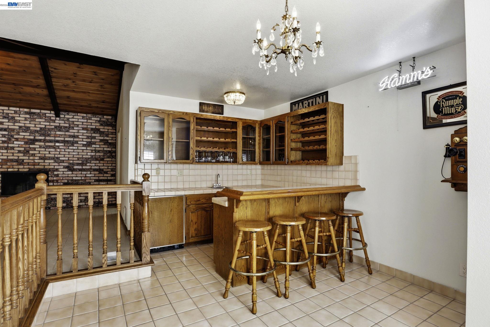 559 Cherry Way Hayward, CA 94541 - Photo 29 of 50 an entryway with a table and chairs