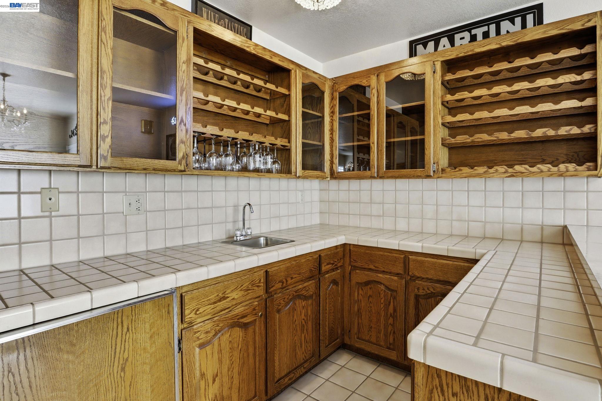 559 Cherry Way Hayward, CA 94541 - Photo 30 of 50 a kitchen with a sink and cabinets