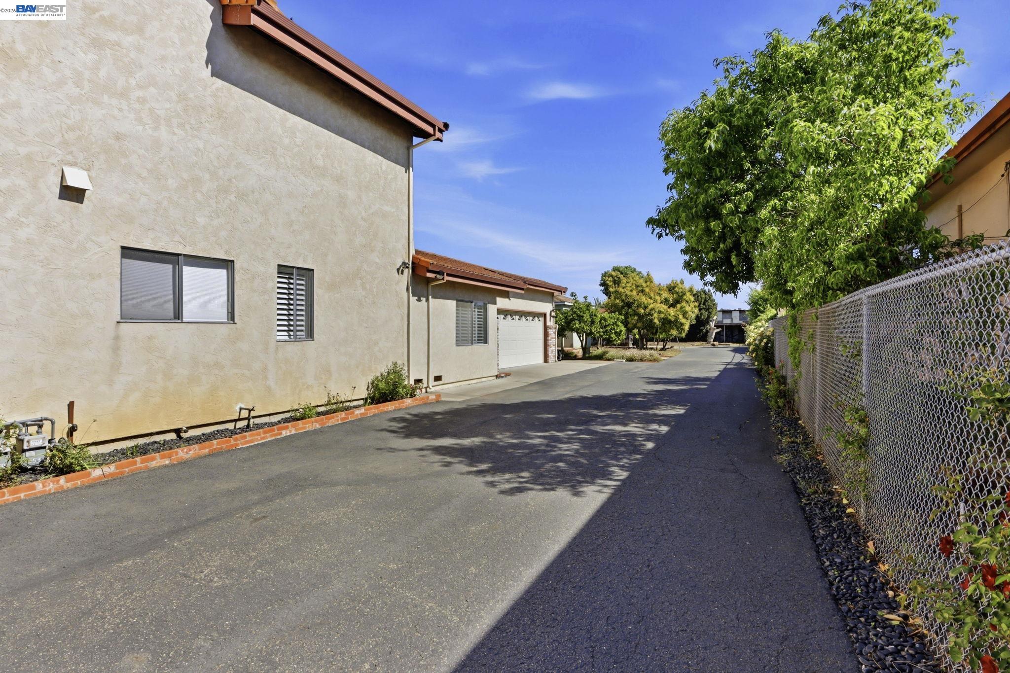 559 Cherry Way Hayward, CA 94541 - Photo 38 of 50 a front view of a house with a yard and garage