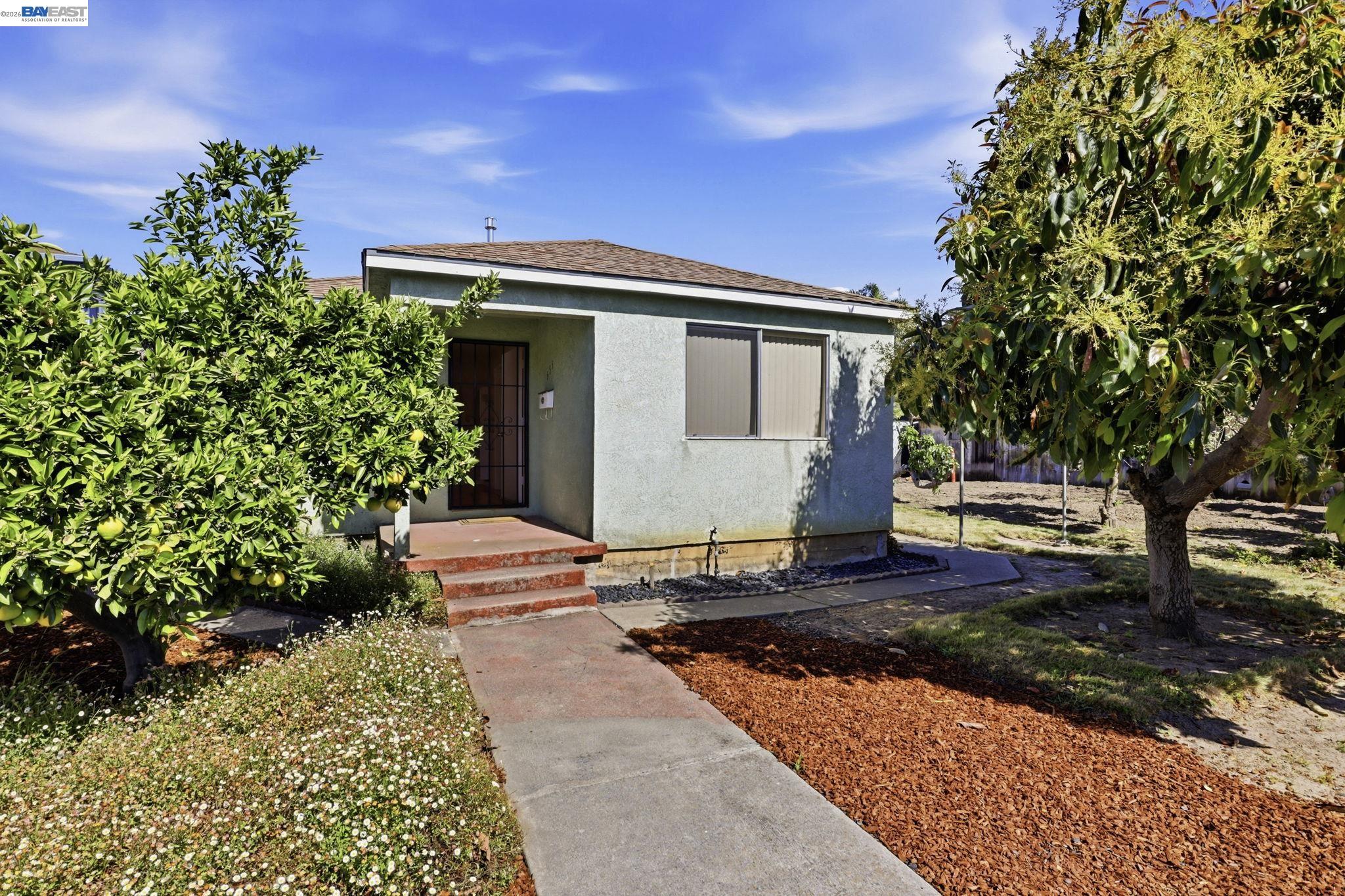 559 Cherry Way Hayward, CA 94541 - Photo 39 of 50 a front view of a house with a yard