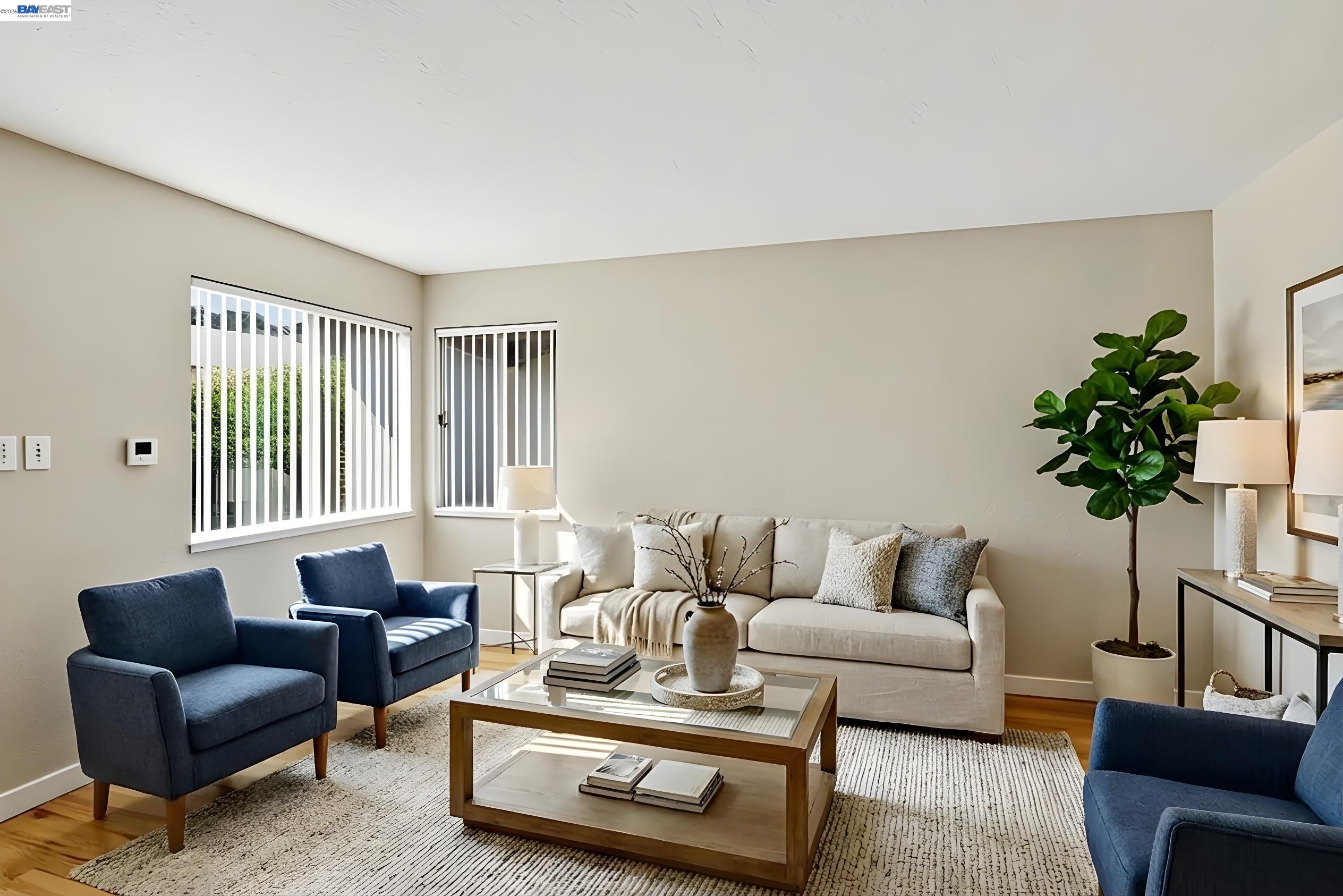559 Cherry Way Hayward, CA 94541 - Photo 40 of 50 a living room with furniture and a potted plant