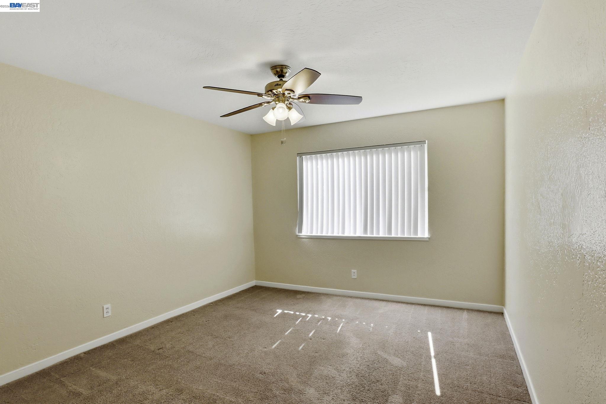 559 Cherry Way Hayward, CA 94541 - Photo 43 of 50 a view of an empty room with a window
