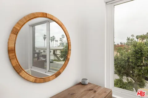 a view of a swimming pool from a bathroom
