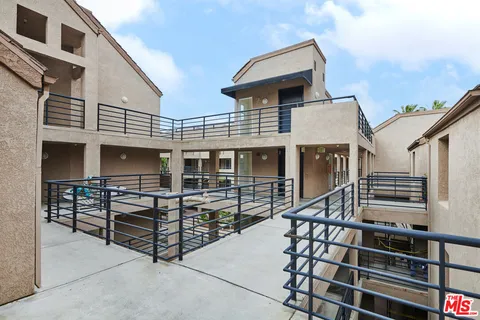a front view of a house with balcony