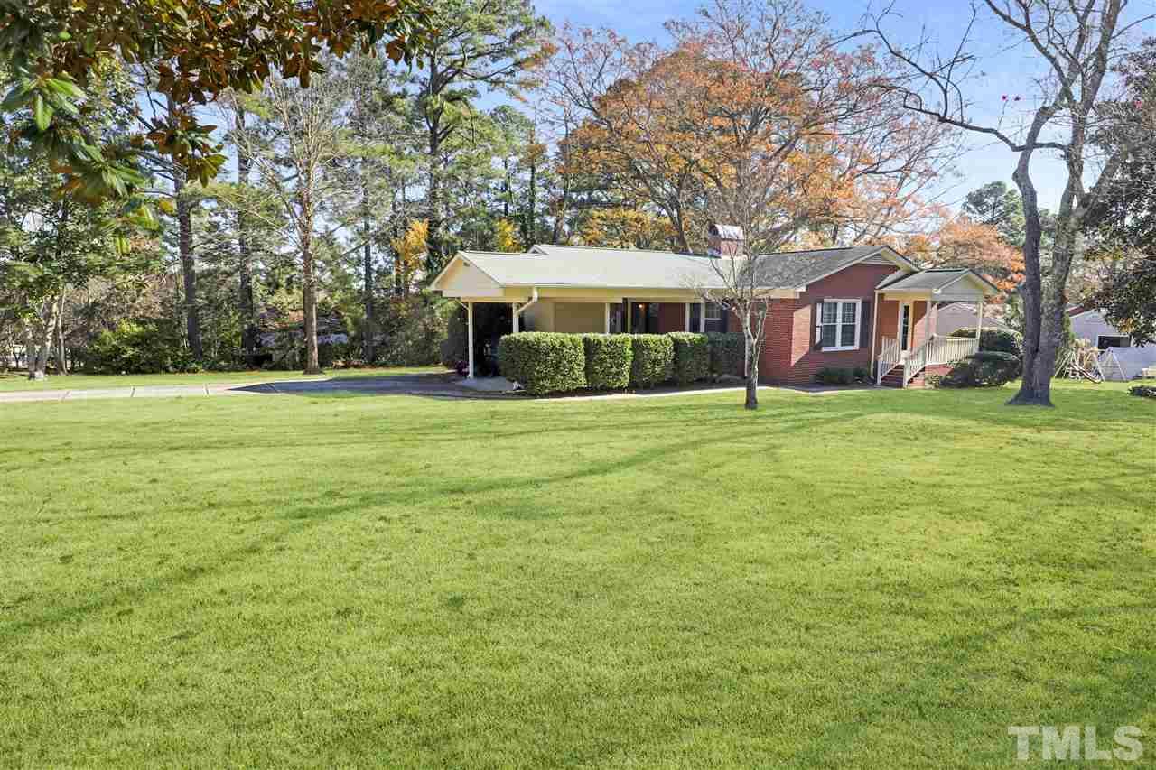 901 Merrie Road Raleigh, NC 27606 - Photo 14 of 18 a view of a house with a yard