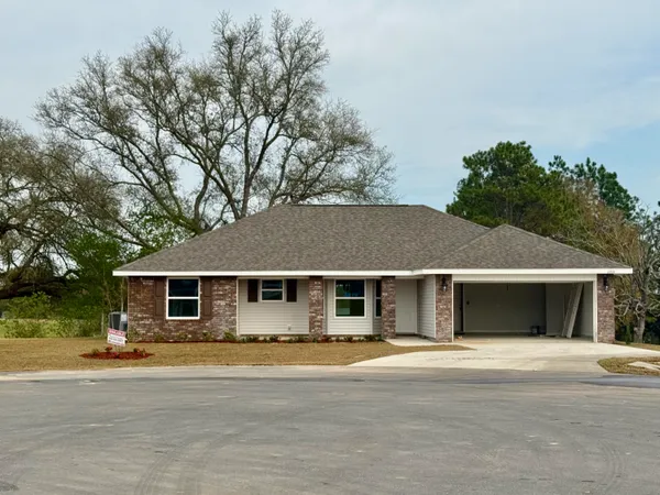 front view of a house with a patio