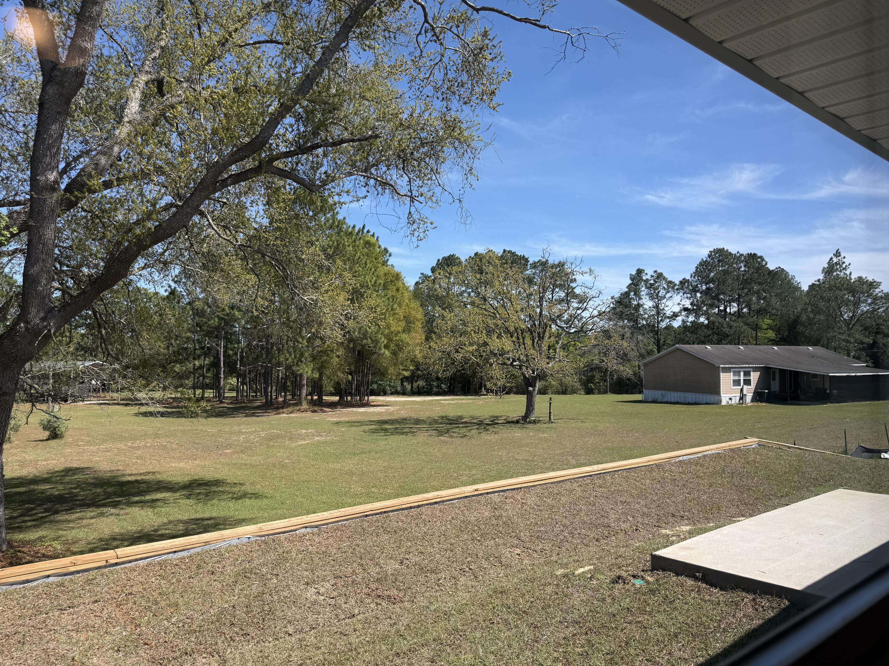6014 Crocket Cove Crestview, FL 32539 - Photo 26 of 29 a view of a tennis court