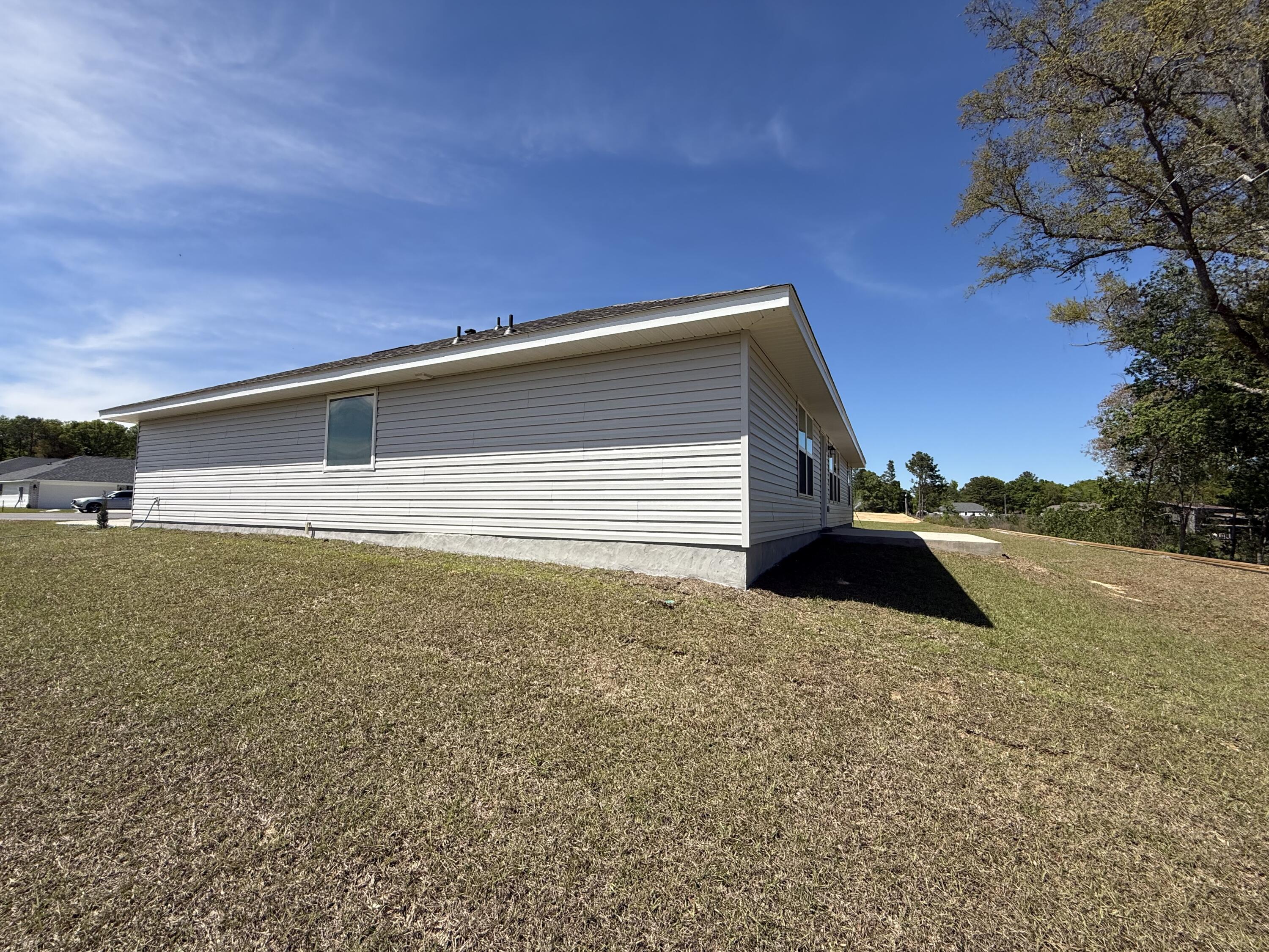 6014 Crocket Cove Crestview, FL 32539 - Photo 27 of 29 a view of outdoor space and yard