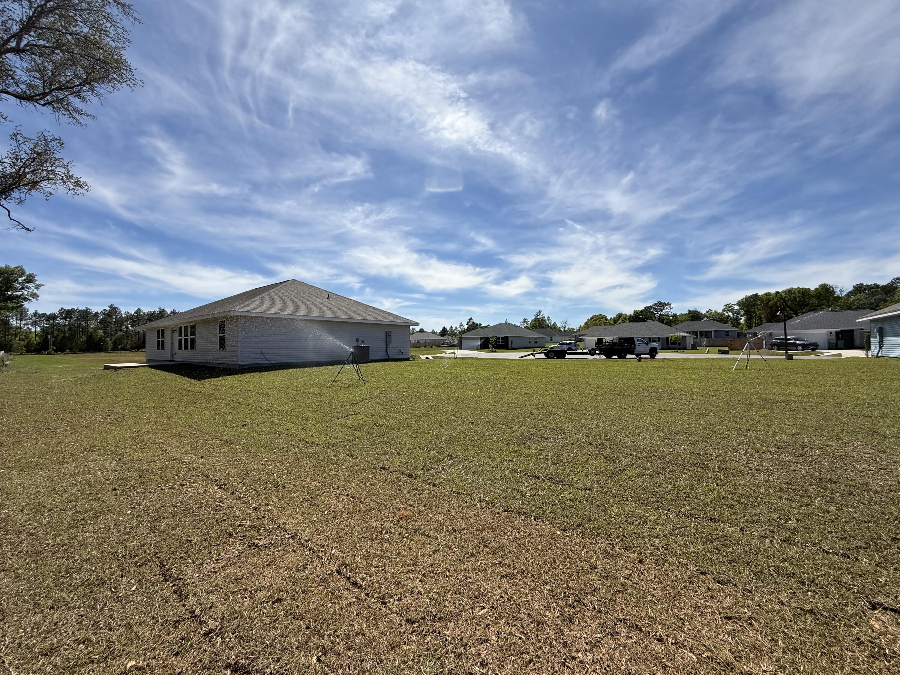 6014 Crocket Cove Crestview, FL 32539 - Photo 29 of 29 a view of an ocean and beach
